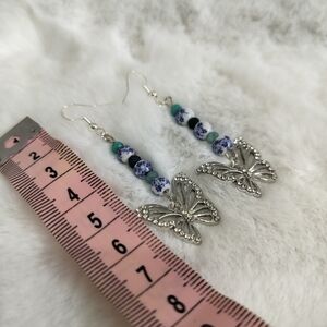 White and Blue with a Beautiful Silver Butterfly